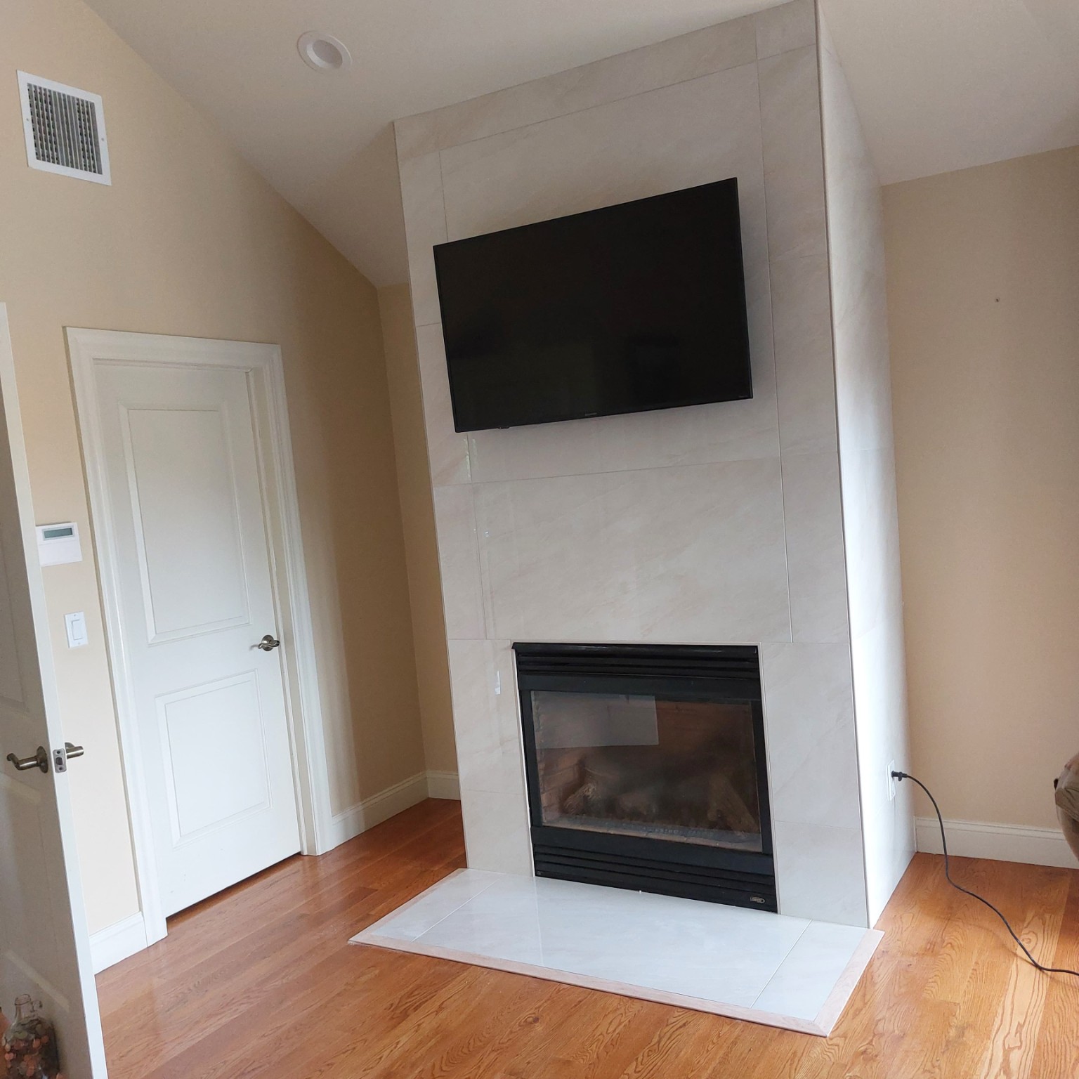 Fireplace and TV wall after renovation